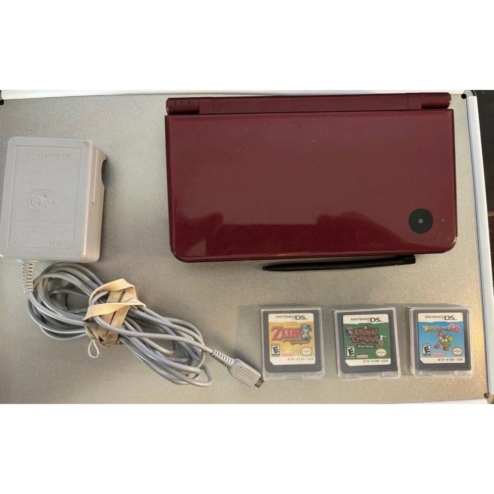 Nintendo DSI xl with three game bundle